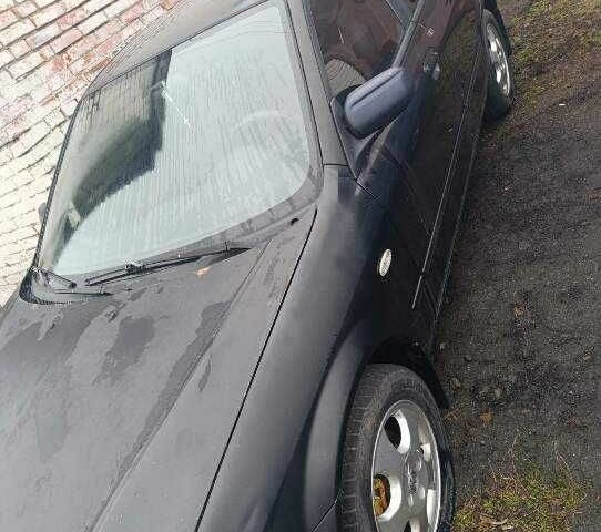 Чорний Мазда 323, об'ємом двигуна 0 л та пробігом 260 тис. км за 1900 $, фото 1 на Automoto.ua