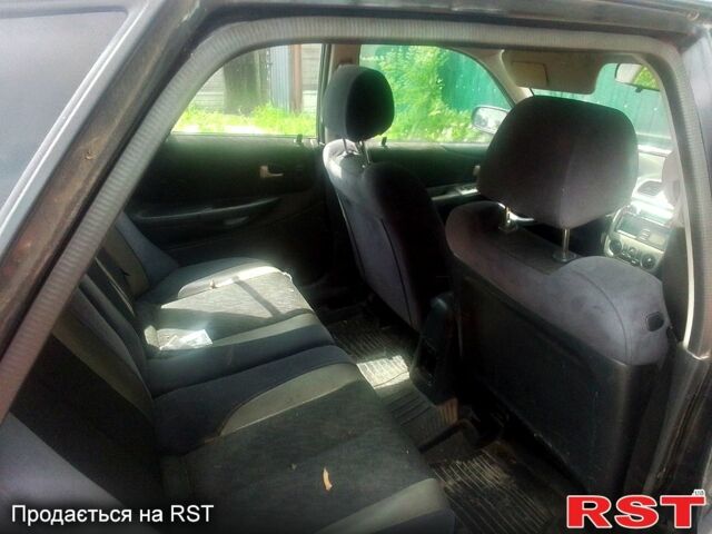 Черный Мазда 323, объемом двигателя 1.5 л и пробегом 0 тыс. км за 2100 $, фото 1 на Automoto.ua