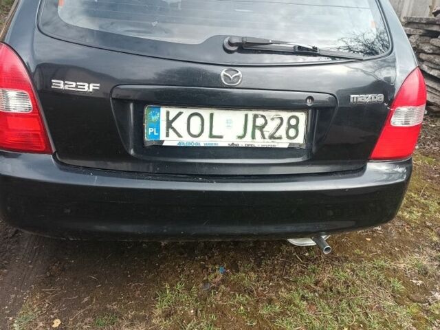 Черный Мазда 323, объемом двигателя 0 л и пробегом 245 тыс. км за 1300 $, фото 1 на Automoto.ua