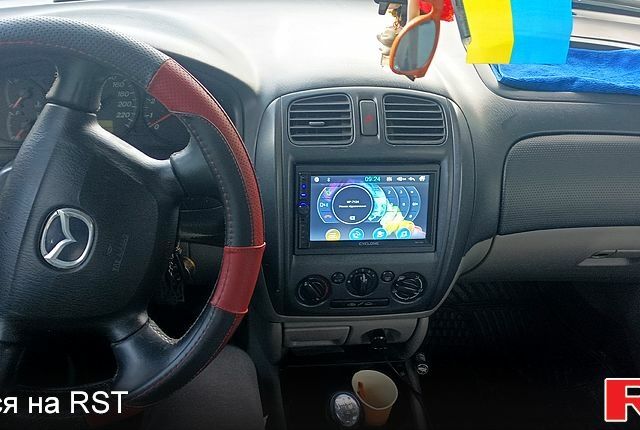 Черный Мазда 323, объемом двигателя 1.6 л и пробегом 0 тыс. км за 1200 $, фото 1 на Automoto.ua