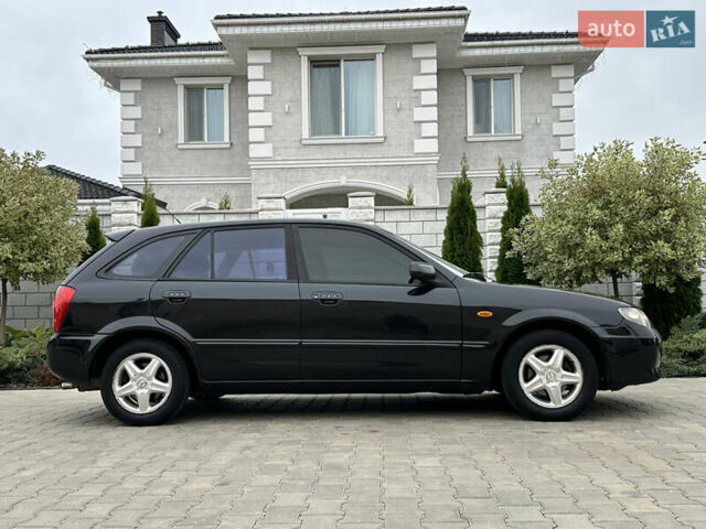 Черный Мазда 323, объемом двигателя 0 л и пробегом 187 тыс. км за 3700 $, фото 1 на Automoto.ua