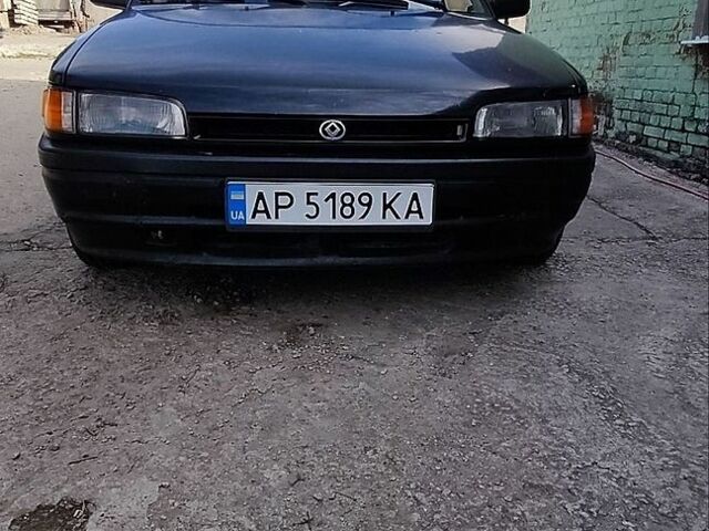 Чорний Мазда 323, об'ємом двигуна 1.72 л та пробігом 315 тис. км за 1600 $, фото 1 на Automoto.ua