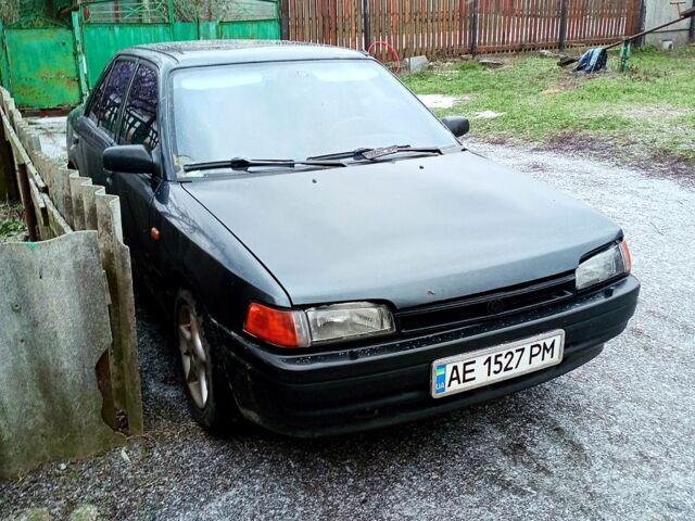 Чорний Мазда 323, об'ємом двигуна 1.7 л та пробігом 0 тис. км за 1500 $, фото 1 на Automoto.ua