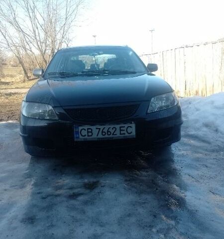 Черный Мазда 323, объемом двигателя 1.6 л и пробегом 270 тыс. км за 1600 $, фото 1 на Automoto.ua