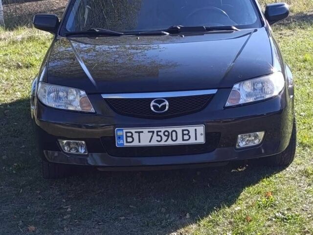 Чорний Мазда 323, об'ємом двигуна 1.6 л та пробігом 196 тис. км за 4500 $, фото 1 на Automoto.ua
