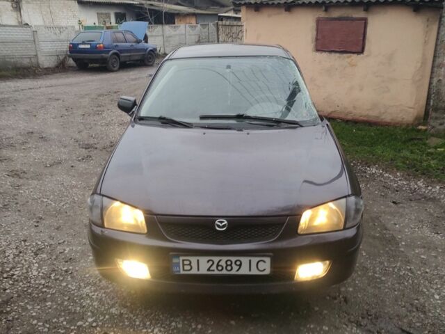 Фіолетовий Мазда 323, об'ємом двигуна 1.5 л та пробігом 310 тис. км за 800 $, фото 1 на Automoto.ua