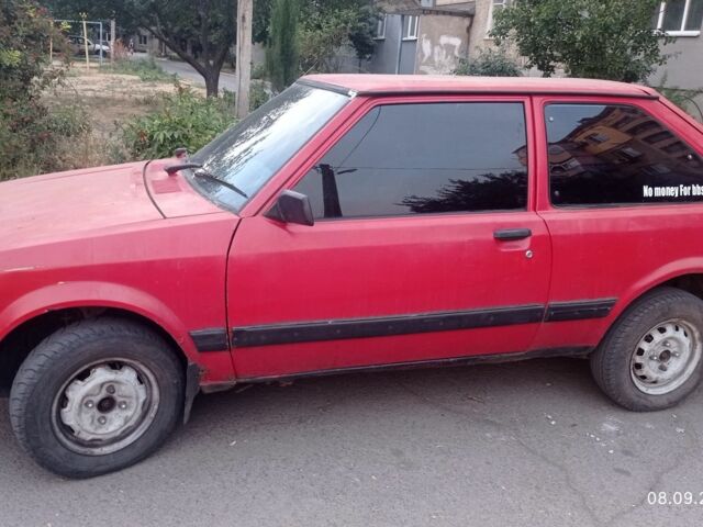 Красный Мазда 323, объемом двигателя 1.5 л и пробегом 250 тыс. км за 600 $, фото 1 на Automoto.ua