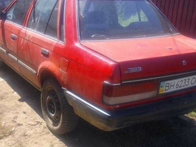 Красный Мазда 323, объемом двигателя 1.3 л и пробегом 1 тыс. км за 404 $, фото 1 на Automoto.ua