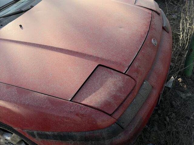 Красный Мазда 323, объемом двигателя 1.6 л и пробегом 999 тыс. км за 452 $, фото 1 на Automoto.ua