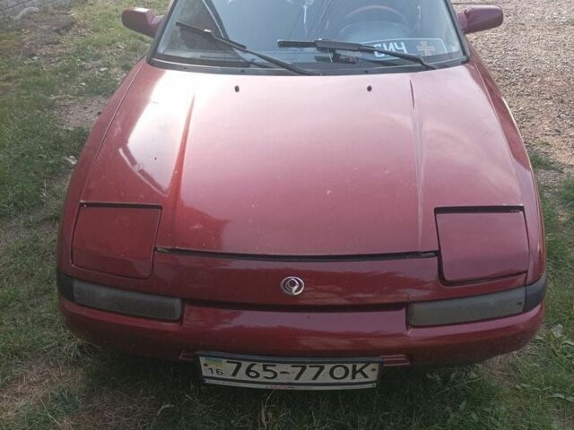 Красный Мазда 323, объемом двигателя 2 л и пробегом 400 тыс. км за 1500 $, фото 1 на Automoto.ua