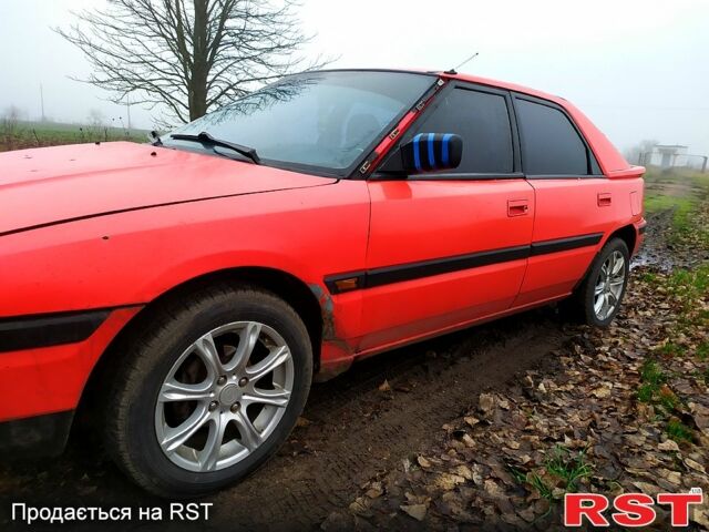 Красный Мазда 323, объемом двигателя 1.6 л и пробегом 100 тыс. км за 1300 $, фото 1 на Automoto.ua