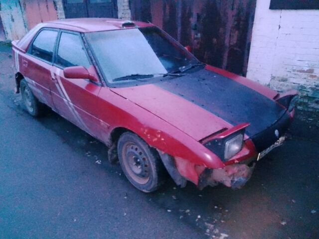 Красный Мазда 323, объемом двигателя 1.6 л и пробегом 999 тыс. км за 500 $, фото 1 на Automoto.ua