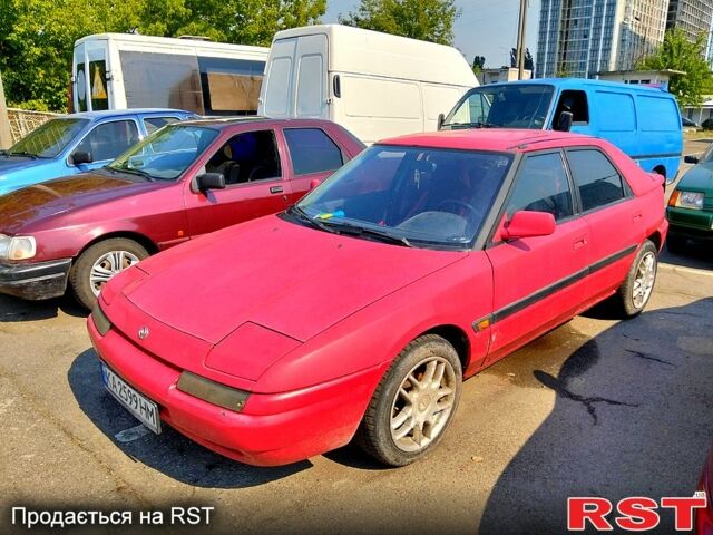 Красный Мазда 323, объемом двигателя 1.8 л и пробегом 143 тыс. км за 1650 $, фото 1 на Automoto.ua