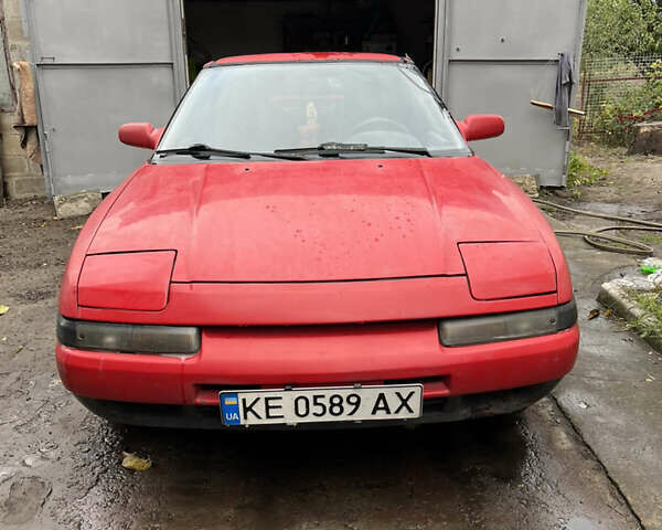 Красный Мазда 323, объемом двигателя 1.6 л и пробегом 400 тыс. км за 1297 $, фото 1 на Automoto.ua