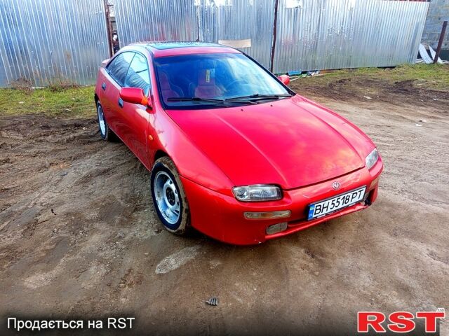 Червоний Мазда 323, об'ємом двигуна 1.5 л та пробігом 352 тис. км за 1500 $, фото 1 на Automoto.ua