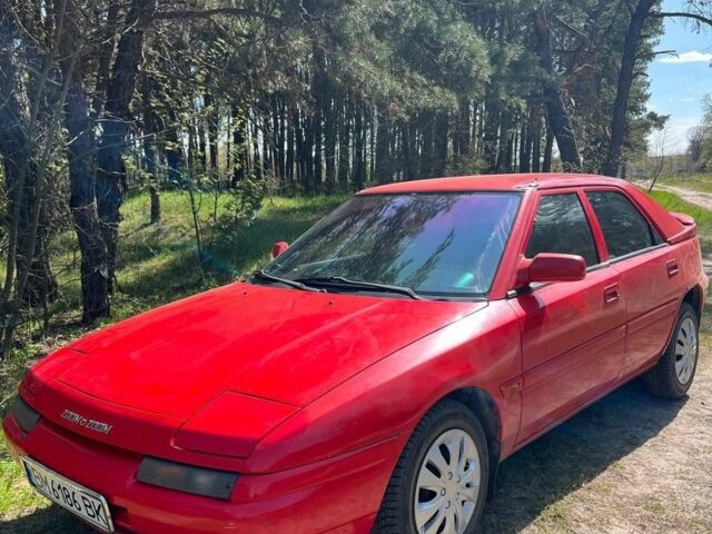 Червоний Мазда 323, об'ємом двигуна 1.6 л та пробігом 322 тис. км за 1550 $, фото 1 на Automoto.ua