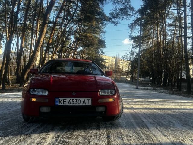 Красный Мазда 323, объемом двигателя 1.5 л и пробегом 394 тыс. км за 2200 $, фото 1 на Automoto.ua