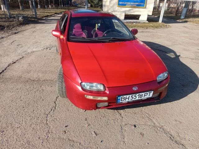 Червоний Мазда 323, об'ємом двигуна 1.5 л та пробігом 343 тис. км за 1500 $, фото 1 на Automoto.ua