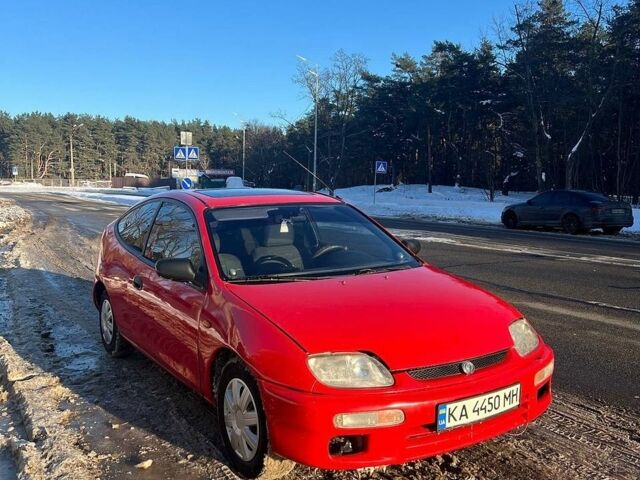 Червоний Мазда 323, об'ємом двигуна 1.5 л та пробігом 400 тис. км за 1850 $, фото 1 на Automoto.ua