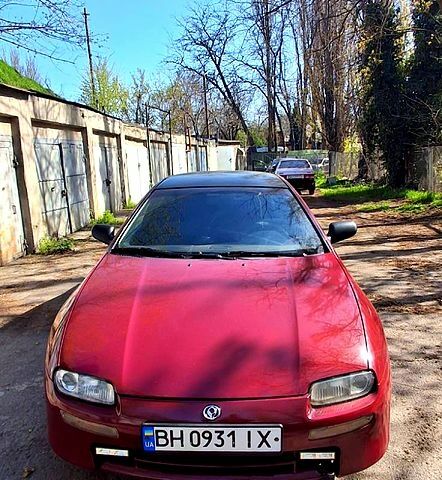 Червоний Мазда 323, об'ємом двигуна 1.5 л та пробігом 350 тис. км за 2000 $, фото 1 на Automoto.ua