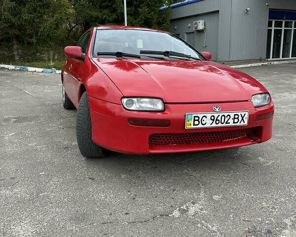 Красный Мазда 323, объемом двигателя 1.49 л и пробегом 450 тыс. км за 2000 $, фото 1 на Automoto.ua