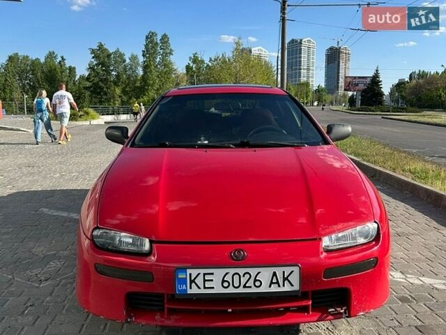 Красный Мазда 323, объемом двигателя 1.5 л и пробегом 426 тыс. км за 2300 $, фото 1 на Automoto.ua