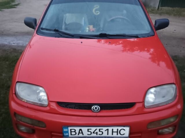 Червоний Мазда 323, об'ємом двигуна 1.5 л та пробігом 30 тис. км за 1919 $, фото 1 на Automoto.ua