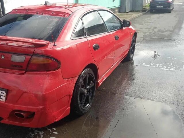 Красный Мазда 323, объемом двигателя 2 л и пробегом 300 тыс. км за 800 $, фото 1 на Automoto.ua
