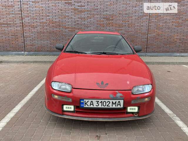Красный Мазда 323, объемом двигателя 1.5 л и пробегом 252 тыс. км за 2200 $, фото 1 на Automoto.ua