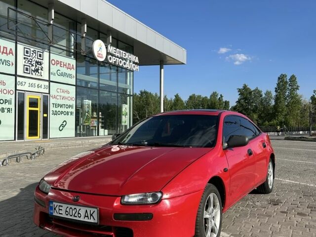 Красный Мазда 323, объемом двигателя 1.5 л и пробегом 426 тыс. км за 2300 $, фото 1 на Automoto.ua