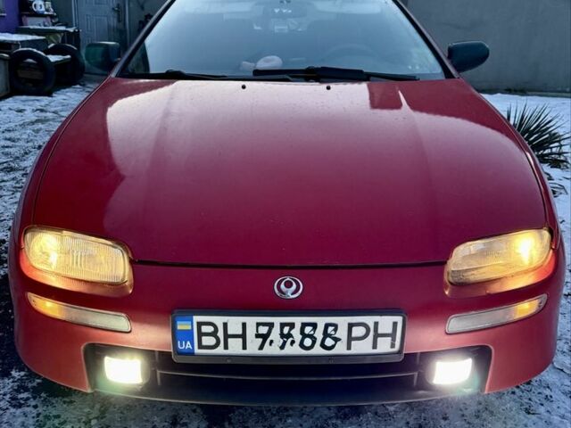 Красный Мазда 323, объемом двигателя 1.5 л и пробегом 400 тыс. км за 2699 $, фото 1 на Automoto.ua