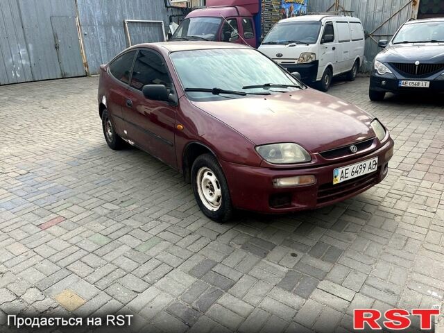 Красный Мазда 323, объемом двигателя 1.5 л и пробегом 0 тыс. км за 1300 $, фото 1 на Automoto.ua