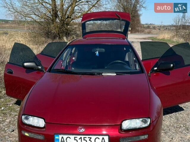 Красный Мазда 323, объемом двигателя 1.49 л и пробегом 301 тыс. км за 2999 $, фото 1 на Automoto.ua