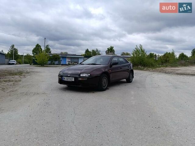 Красный Мазда 323, объемом двигателя 1.5 л и пробегом 278 тыс. км за 2400 $, фото 1 на Automoto.ua