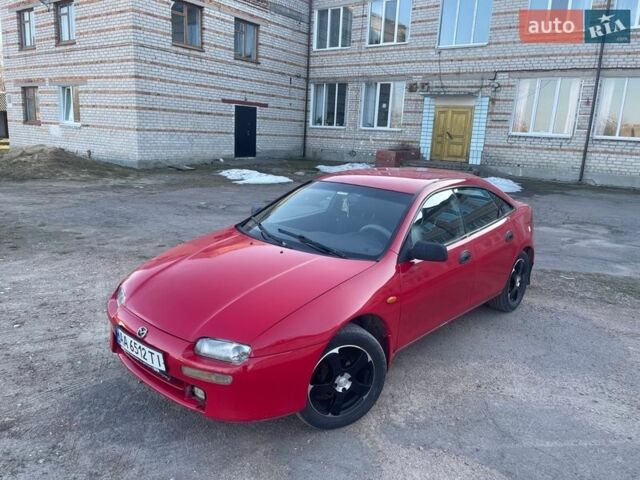Червоний Мазда 323, об'ємом двигуна 1.5 л та пробігом 177 тис. км за 2200 $, фото 1 на Automoto.ua
