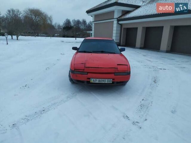 Красный Мазда 323, объемом двигателя 1.6 л и пробегом 100 тыс. км за 1400 $, фото 1 на Automoto.ua