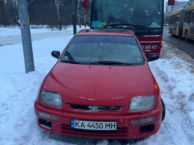 Червоний Мазда 323, об'ємом двигуна 1.5 л та пробігом 320 тис. км за 2200 $, фото 1 на Automoto.ua