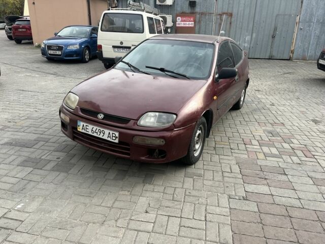 Червоний Мазда 323, об'ємом двигуна 0 л та пробігом 10 тис. км за 1296 $, фото 1 на Automoto.ua