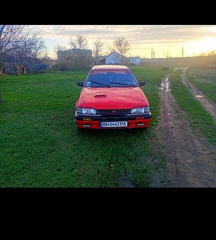 Червоний Мазда 323, об'ємом двигуна 1.3 л та пробігом 0 тис. км за 700 $, фото 1 на Automoto.ua