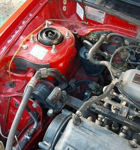 Красный Мазда 323, объемом двигателя 1.6 л и пробегом 400 тыс. км за 2450 $, фото 1 на Automoto.ua