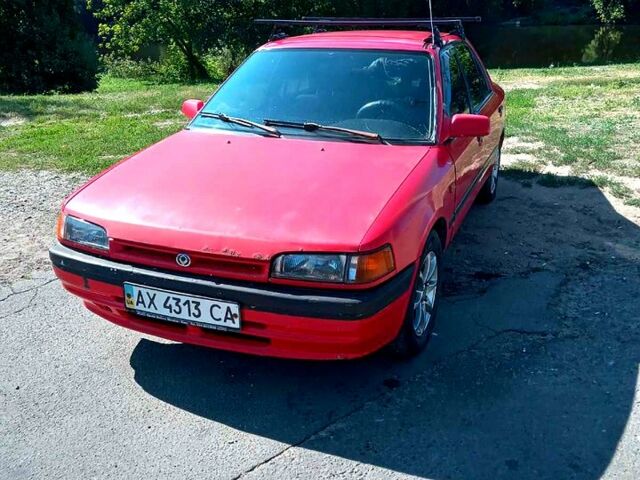 Червоний Мазда 323, об'ємом двигуна 1.7 л та пробігом 0 тис. км за 1200 $, фото 1 на Automoto.ua
