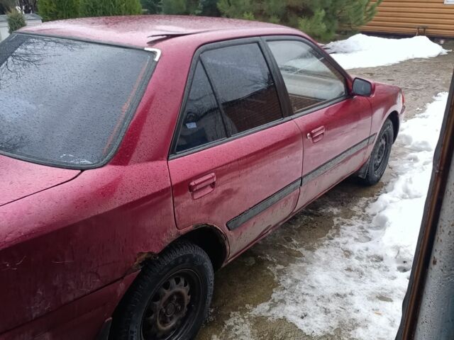 Красный Мазда 323, объемом двигателя 1 л и пробегом 270 тыс. км за 903 $, фото 1 на Automoto.ua