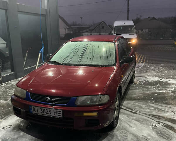 Червоний Мазда 323, об'ємом двигуна 1.49 л та пробігом 400 тис. км за 1100 $, фото 1 на Automoto.ua