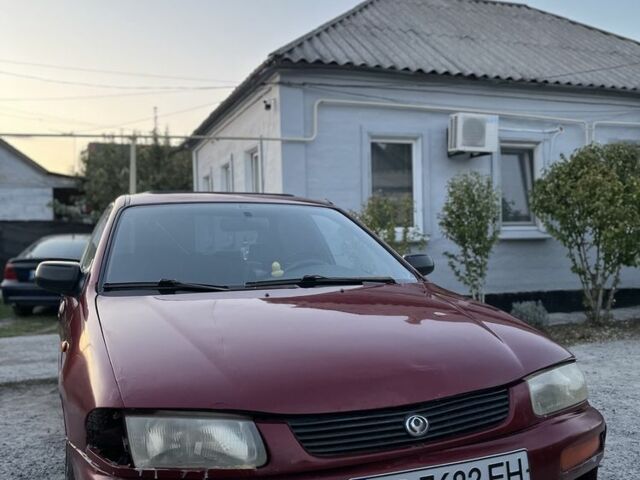 Красный Мазда 323, объемом двигателя 0 л и пробегом 431 тыс. км за 1205 $, фото 1 на Automoto.ua