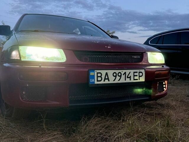 Червоний Мазда 323, об'ємом двигуна 1.5 л та пробігом 286 тис. км за 1700 $, фото 1 на Automoto.ua