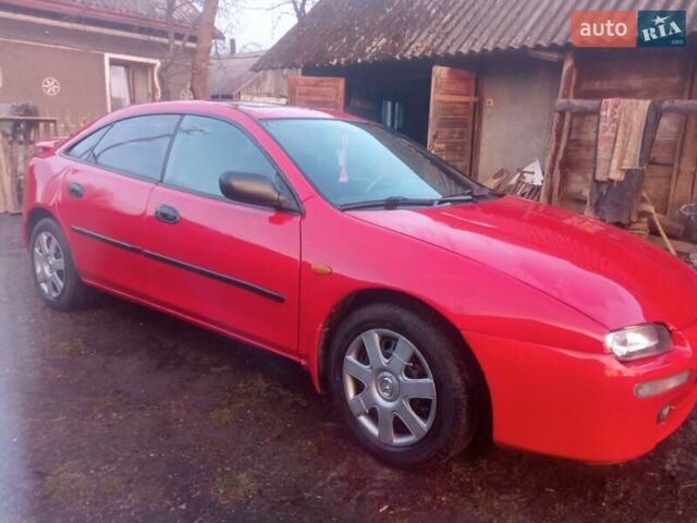 Красный Мазда 323, объемом двигателя 1.49 л и пробегом 330 тыс. км за 2900 $, фото 1 на Automoto.ua