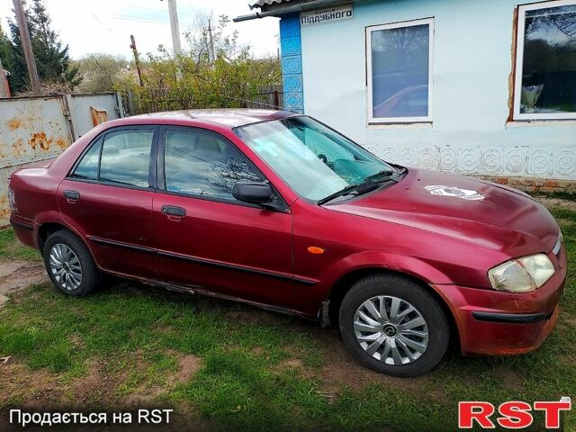 Красный Мазда 323, объемом двигателя 2 л и пробегом 0 тыс. км за 1000 $, фото 1 на Automoto.ua