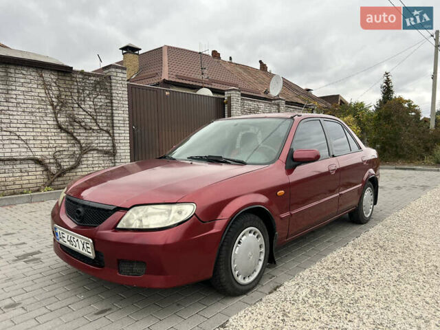 Красный Мазда 323, объемом двигателя 1.6 л и пробегом 333 тыс. км за 1500 $, фото 1 на Automoto.ua