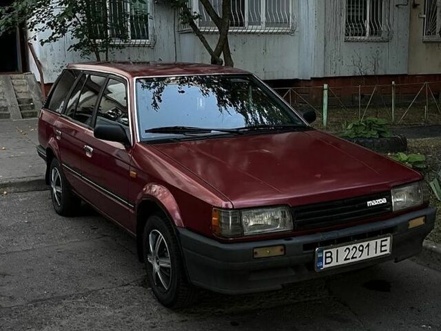 Червоний Мазда 323, об'ємом двигуна 1.7 л та пробігом 442 тис. км за 1603 $, фото 1 на Automoto.ua