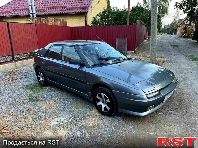 Мазда 323, объемом двигателя 1.8 л и пробегом 250 тыс. км за 1200 $, фото 1 на Automoto.ua